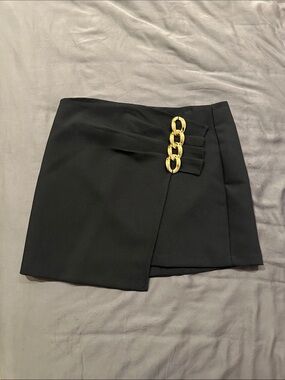 MANGO Black Mini Skirt with Gold Chain Accent
